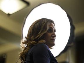 Finance Minister Chrystia Freeland participates in a television interview after presenting the budget on Parliament Hill in Ottawa, Tuesday, April 16, 2024.