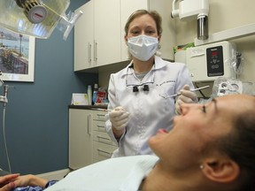 A Calgary dentist prepares to conduct a fluoride treatment for a patient. Alberta has, at more than 70 per cent, one of the highest percentages of community fluoridation in Canada. At one per cent, Quebec is among the lowest rates of water fluoridation in Canada.