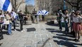 Students stand in front of a pro-Palestinian counter-protest at the end of a vigil at McGill University on Tuesday, April 9, 2024 to demand the release of the Hamas-held Israeli hostages held by Hamas in Gaza.