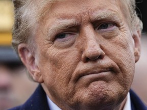 Former president Donald Trump reacts during a news conference after attending the wake of New York City police officer Jonathan Diller, Thursday, March 28, 2024, in Massapequa Park, N.Y.