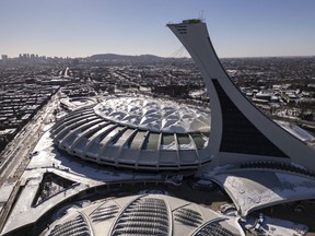 An aerial view of the Olympic Stadium in Montreal, Monday Feb. 5, 2024. The Quebec government has awarded the organization that manages the stadium up to $40 million to pay for repairs and decontamination following a March 21 fire.