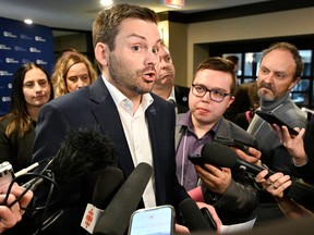 Parti Quebecois Leader Paul St-Pierre Plamondon speaks to reporters at the opening of a Parti Quebecois national council meeting, Saturday, April 13, 2024 in Drummondville, Quebec.