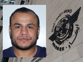 A mugshot of Mahmud Mohamed Elsuwaye Sayeh with a picture of the ICAO logo outside a building