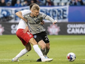 CF Montreal defender Robert Thorkelsson, right, is challenged by Vaughan SC's Emmanuel Zambazis during first half preliminary round Canadian Championship soccer action in Montreal, Tuesday, April 18, 2023. CF Montreal loaned Thorkelsson to second-division Norwegian club Kongsvinger IL Toppfotball on Thursday.