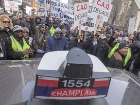 A trial begins Tuesday in a class-action lawsuit brought by former holders of Quebec taxi permits who allege the provincial government effectively expropriated their property without proper compensation when it abolished those permits. Quebec taxi drivers protest against new legislation to deregulate the industry, in Montreal, Friday, April 5, 2019.