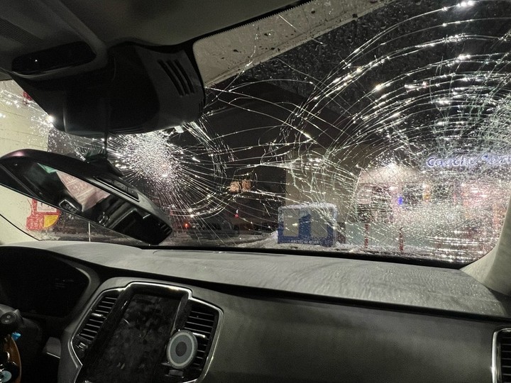  The windshield of Hillary Cohen and Dan Cholewa’s car was smashed on Thursday, April 4, 2024 while they were driving on Highway 40 toward Montreal.