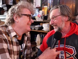 Canadiens fan Sylvain Grenon speaks with Gazette reporter Brendan Kelly at McLean's Pub.