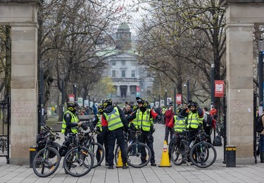 Montreal police control McGill University's Roddick Gates ahead of a pro-Israel counter-demonstration near the pro-Palestinian encampment on the campus in Montreal on Thursday, May 2, 2024.