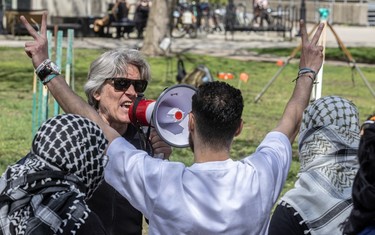 Cuban-born Cesar Reynel Aguilera showed up at the protest camp's press conference at McGill University in Montreal on Monday May 6, 2024 with a bull horn.