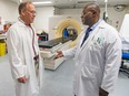 Two doctors talk inside a MRI facility in a hospital