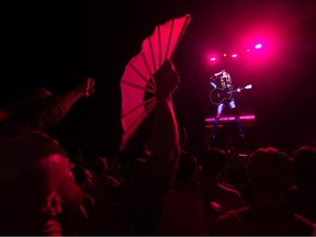 Fans watch U.S. pop star Madonna perform during a free concert at Copacabana beach in Rio de Janeiro, Brazil