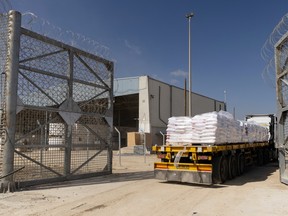 A truck makes its way into the Gaza Strip as it is carrying humanitarian