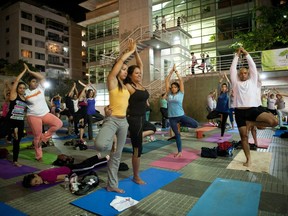 People practise yoga in a public square in Caracas, Venezuela in this file photo.