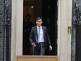 Britain's Prime Minister Rishi Sunak walks from 10 Downing Street to speak to the media in London Wednesday, May 22, 2024, as he announces that he is to call a General Election for July 4.