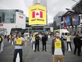 Cutouts of fugitives are seen in Dundas Square, during a press conference announcing the updated list of Bolo's Top 25 most wanted fugitives in Canada, in Toronto, Monday, May 1, 2023.