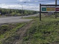 An extreme fire warning sign is shown along Highway 97 toward Fort Nelson outside the Charlie Lake Fire Hall near Fort St. John, B.C., on Monday, May 13, 2024.