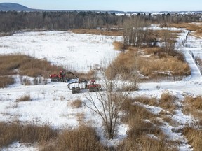 An aerial view of the construction site of the new EV battery plant, Northvolt, in Saint-Basile-le-Grand, east of Montreal, Quebec, Friday, Jan. 19, 2024. The Swedish multinational announced Thursday that work had been temporarily suspended on the site in McMasterville and Saint-Basile-le-Grand ?out of respect for the ongoing legal process.?