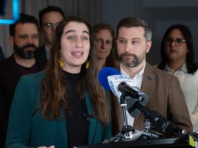 Quebec Solidaire co-spokes people Gabriel Nadeau-Dubois and Emilise Lessard-Therrien speak to the media after the party's caucus meeting Thursday, January 25, 2024 in Laval, Que.