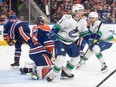 Canucks' Brock Boeser is seen screaming with joy in front of Oilers goalie Stuart Skinner after Boeser scored one of his seven playoff goals.