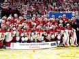 Members of team Czech Republic celebrate with their trophy after they defeated Switzerland 2-0 in a gold-medal match at the World Championships in Prague on Sunday.