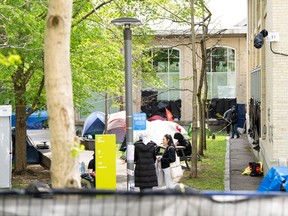 Activists are seen in a pro-Palestinian encampment set up on the UQAM grounds, in Montreal, Monday, May 13, 2024.