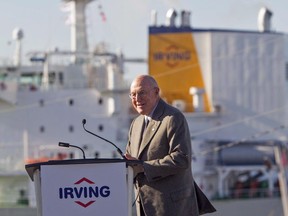 Arthur Irving, then chairman of Irving Oil, takes to the podium during the grand opening of the Halifax Harbour Terminal in Dartmouth, N.S., Thursday, Oct. 20, 2016.