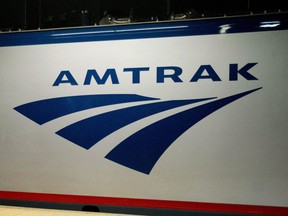 An Amtrak logo is seen on a train at 30th Street Station in Philadelphia, Feb. 6, 2014.