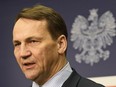Poland's Foreign Minister Radek Sikorski addresses reporters at the Foreign Ministry in Warsaw, Poland, on Feb. 14, 2024.