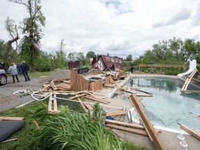 Weather damage is seen in Tres-Saint-Redempteur, Quebec, on Tuesday, May 28, 2024. Environment Canada says the tornado that hit west of Montreal on Monday generated maximum wind speeds of about 155 kilometres per hour.