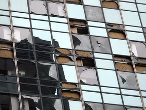 Blown-out windows on a high-rise downtown building are shown in the aftermath of a severe thunderstorm Friday, May 17, 2024, in Houston.