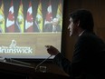 New Brunswick Premier Blaine Higgs is seen via video conference as Prime Minister Justin Trudeau speaks during an announcement on early learning and child care in New Brunswick, in Ottawa, on Monday, Dec. 13, 2021.