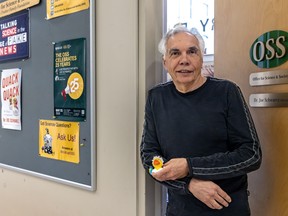 Joe Schwarcz holds a toy duck as he stands in the doorway of McGill's Office for Science and Society.