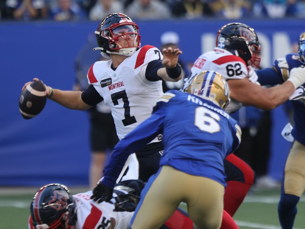 Alouettes' Cody Fajardo with the ball in first half CFL action against the Winnipeg Blue Bombers, in Winnipeg on June 6, 2024.