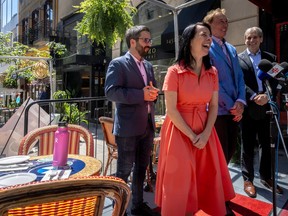 Valérie Plante smiles at a press conference on a terrasse.
