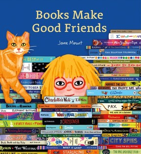 A children's book cover illustration shows a woman or girl amid stacks of books with their titles, such as Charlotte's Web, visible on the spines. A smiling cat is walking atop one of the stacks. The title Books Make Good Friends and the author's name are overhead.