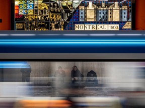 A train zooms by at McGill métro station in Montreal.