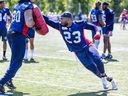 Defensive lineman Avery Ellis takes part in a drill during Montreal Alouettes training camp practice in St-Jérôme on Thursday May 23, 2024.