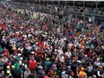 Fans watch as drivers celebrate on the podium after the 2023 Formula One Grand Prix at Circuit Gilles-Villeneuve in Montreal, on June 18, 2023.