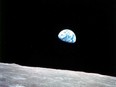 This NASA image obtained on April 22, 2009, Earth Day, shows the Earthrise over the moon made on Christmas Eve, Dec. 24, 1968. from Apollo 8, the first manned mission to the moon, as it entered lunar orbit.