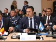 Argentina's Defense Minister Luis Petri, centre, attends a meeting of the Ukraine Defense Contact Group in the format of NATO defense ministers at NATO headquarters in Brussels, Thursday, June 13, 2024.