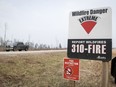 A wildfire danger sign is set to extreme near Fort McMurray, Wednesday, May 15, 2024.