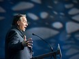 Premier François Legault speaks from a lectern at he CAQ's council meeting in St-Hyacinthe on May 25, 2024.