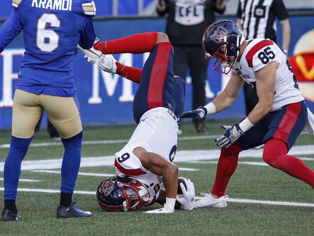 Alouettes receiver Tyson Philpot runs the ball in for the touchdown during first half Thursday night in Winnipeg. 