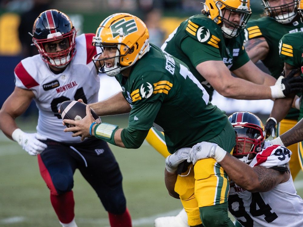 Alouettes' Mustafa Johnson tackles Elks quarterback McLeod Bethel-Thompson during game last Friday in Edmonton.
