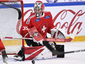 London goalie Connor Hughes makes a save while playing for Switzerland in a game against the Czech Republic on Feb. 11, 2024. (Getty Images)