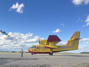 Eight amphibious waterbombers were attacking the 15-square-kilometre fire, four of them from the province, plus two from Quebec and two from Ontario.