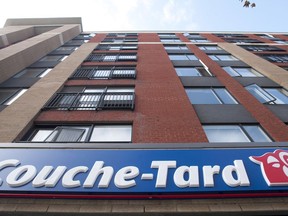 A Couche-Tard convenience store is shown in Montreal. The global retail chain reported sharply lower profits as consumers cut back on spending.
