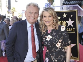 Pat Sajak, left, and Vanna White, from Wheel of Fortune, attend a ceremony honouring Harry Friedman with a star on the Hollywood Walk of Fame in Los Angeles on Nov. 1, 2019.