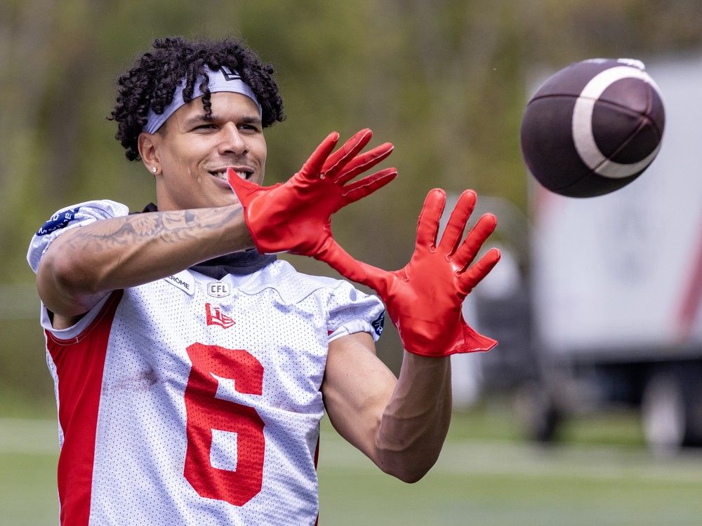Receiver Tyson Philpot catches a football during Montreal Alouettes training camp practice in St-Jérôme on Thursday May 16, 2024.