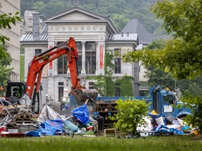Front-end loaders and dump trucks were brought in to help dismantle the pro-Palestinian encampment at McGill University in Montreal Wednesday, July 10, 2024.